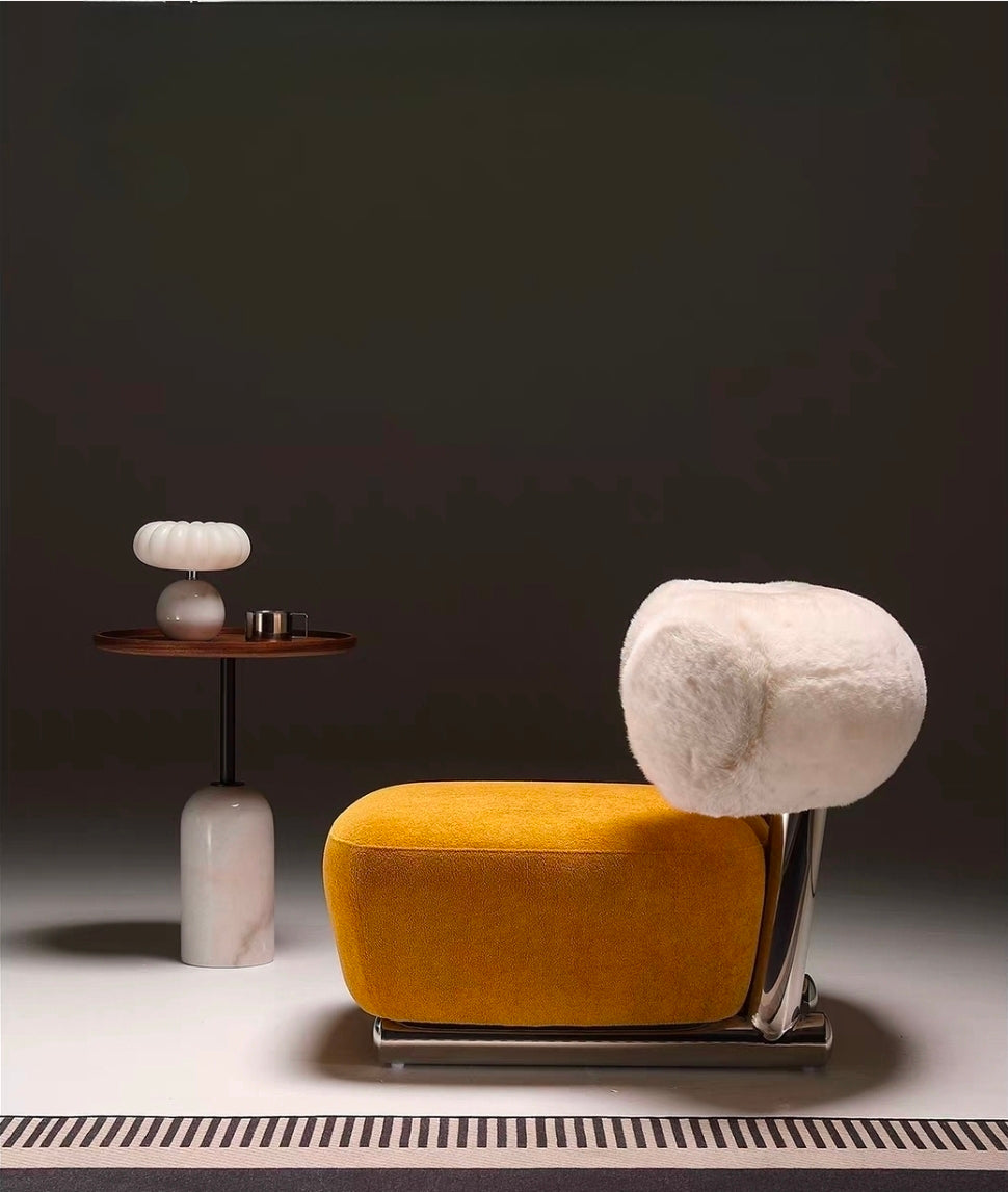 Italian-inspired lounge chair with cylindrical backrest and low profile