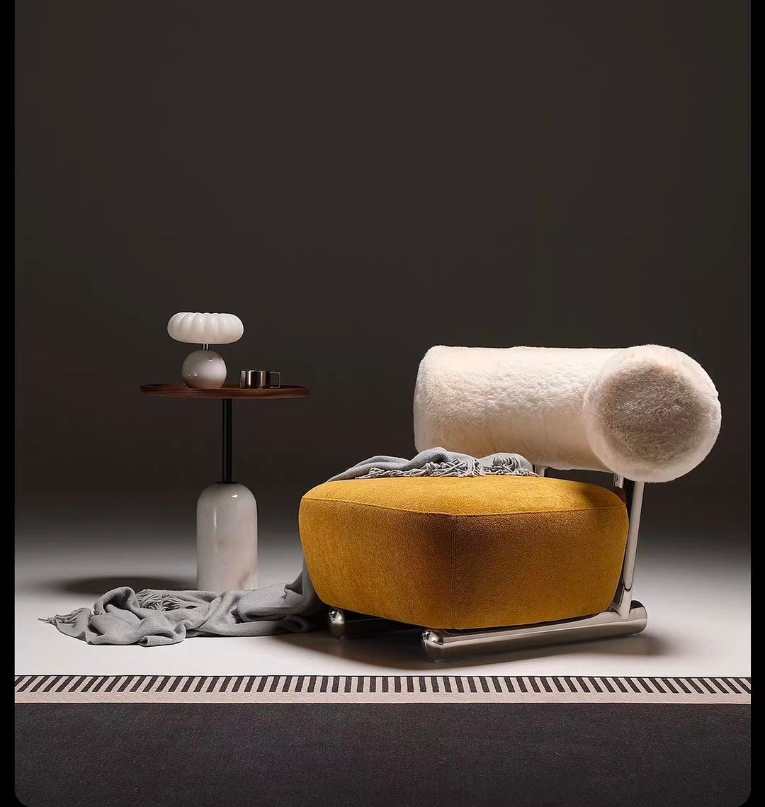 Cylindrical upholstered backrest on designer accent chair