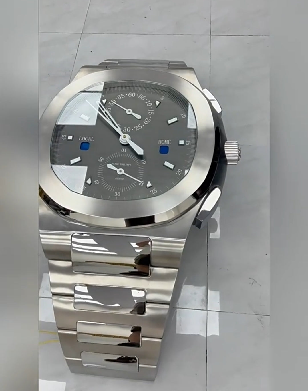 Silver luxury stainless steel coffee table in unique watch shape for modern living rooms
