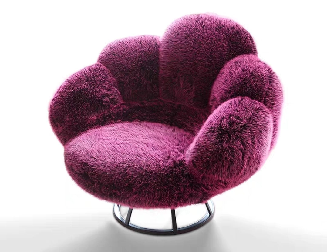 Orchid pink plush swivel chair with petal-inspired design