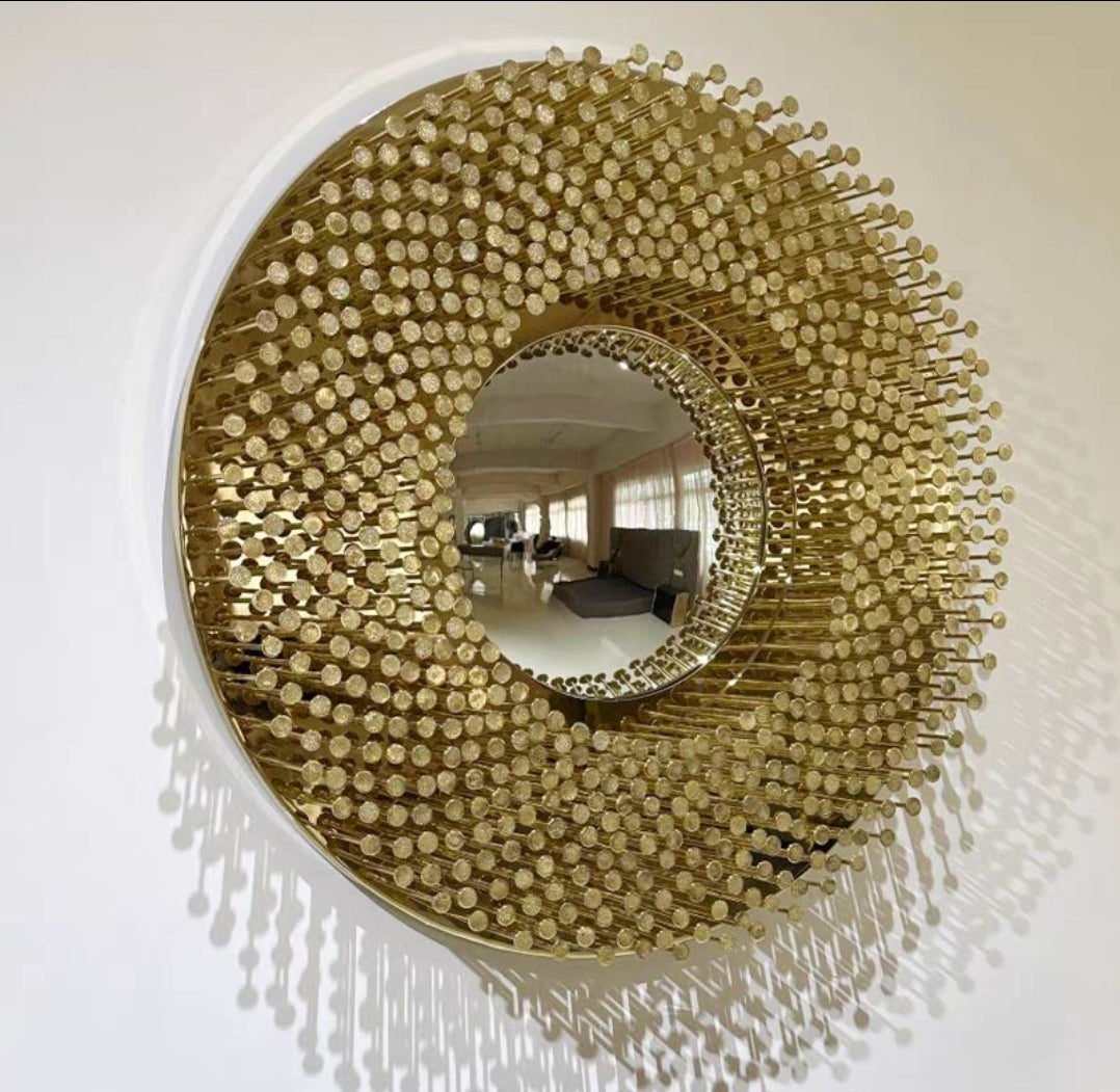 Circular golden halo wall mirror with artisan-crafted frame