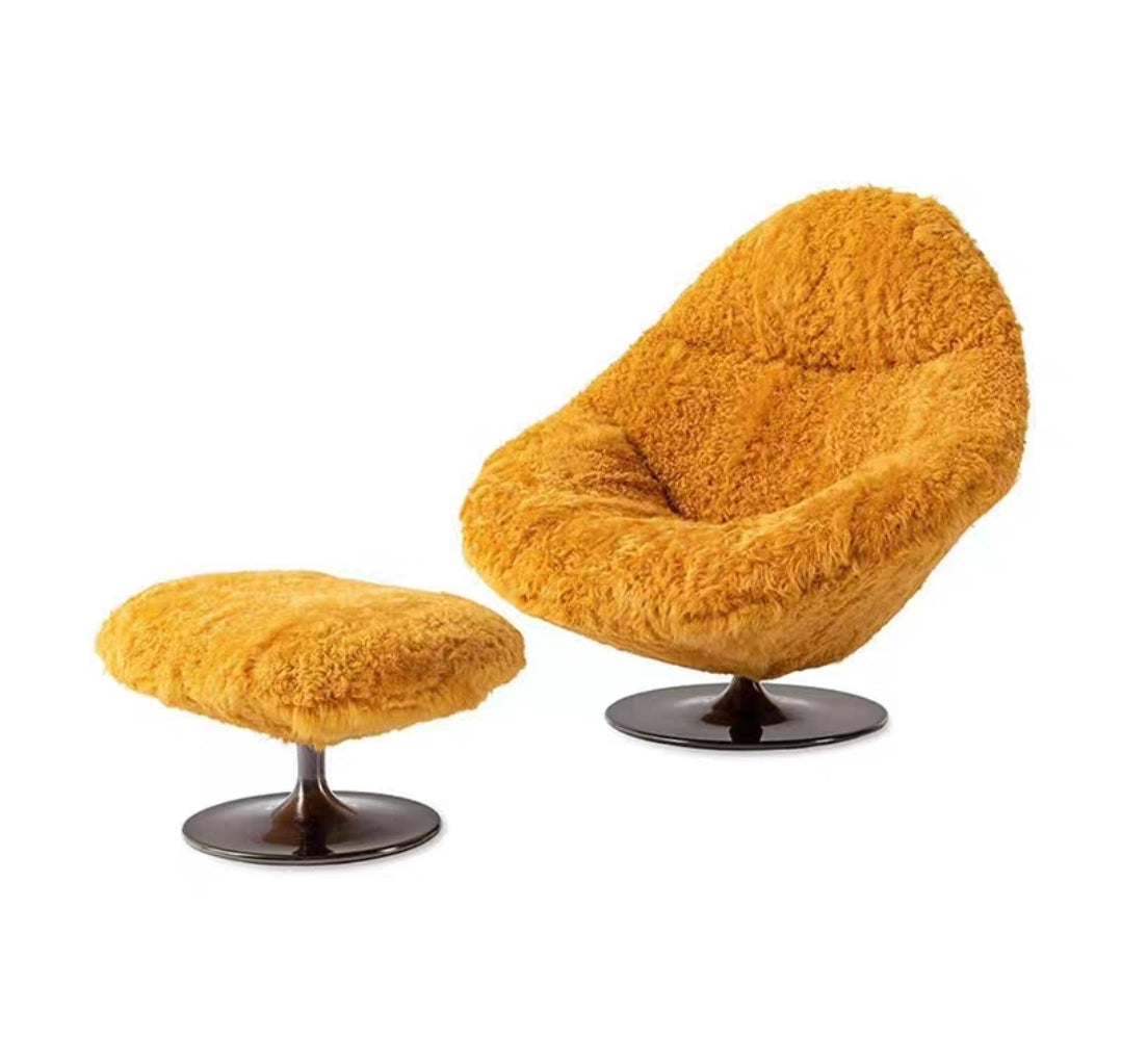 Soft yellow fluffy lounge chair with matching ottoman

